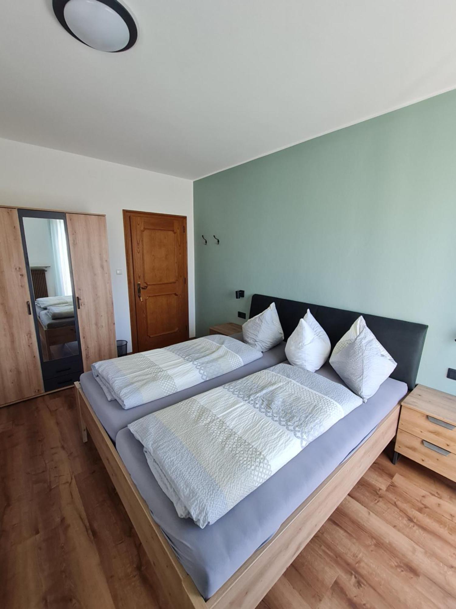 Dreibettzimmer mit Balkon
